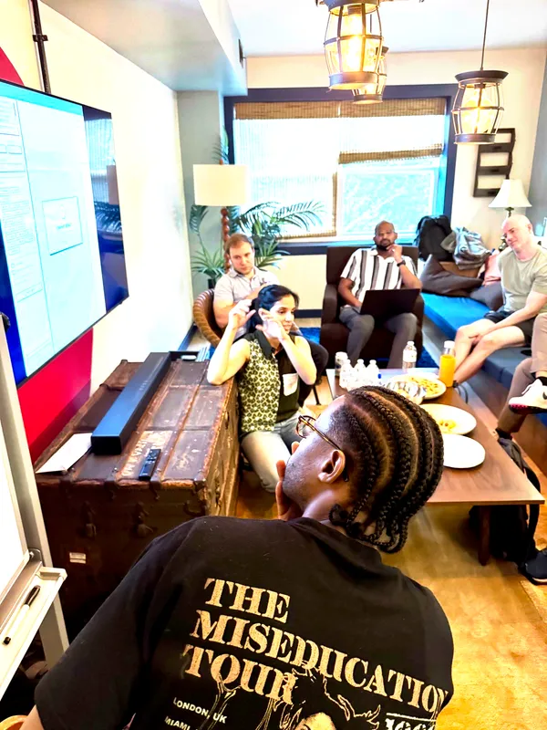 Close-up view of attendees watching a presentation at a Product Leaders event, June 2026