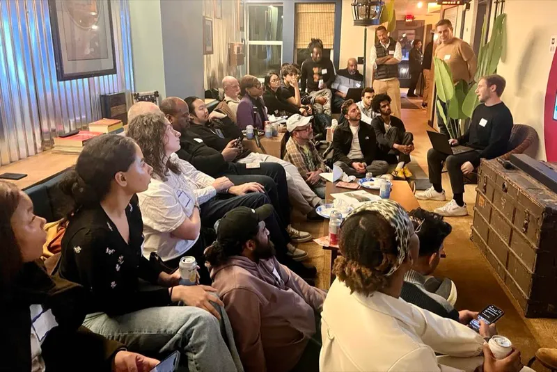 Tight audience shot showing close engagement at an AI Build Club event, March 2026