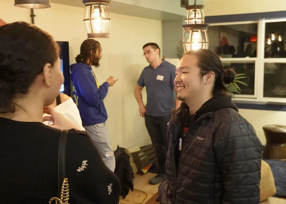 Attendees laughing together at the March 2026 event